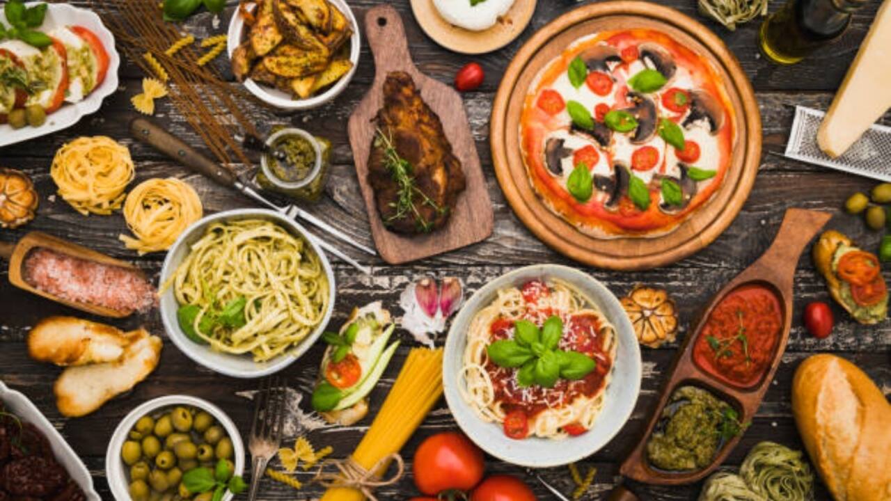 Top view table full of food Sharing dinner with friends