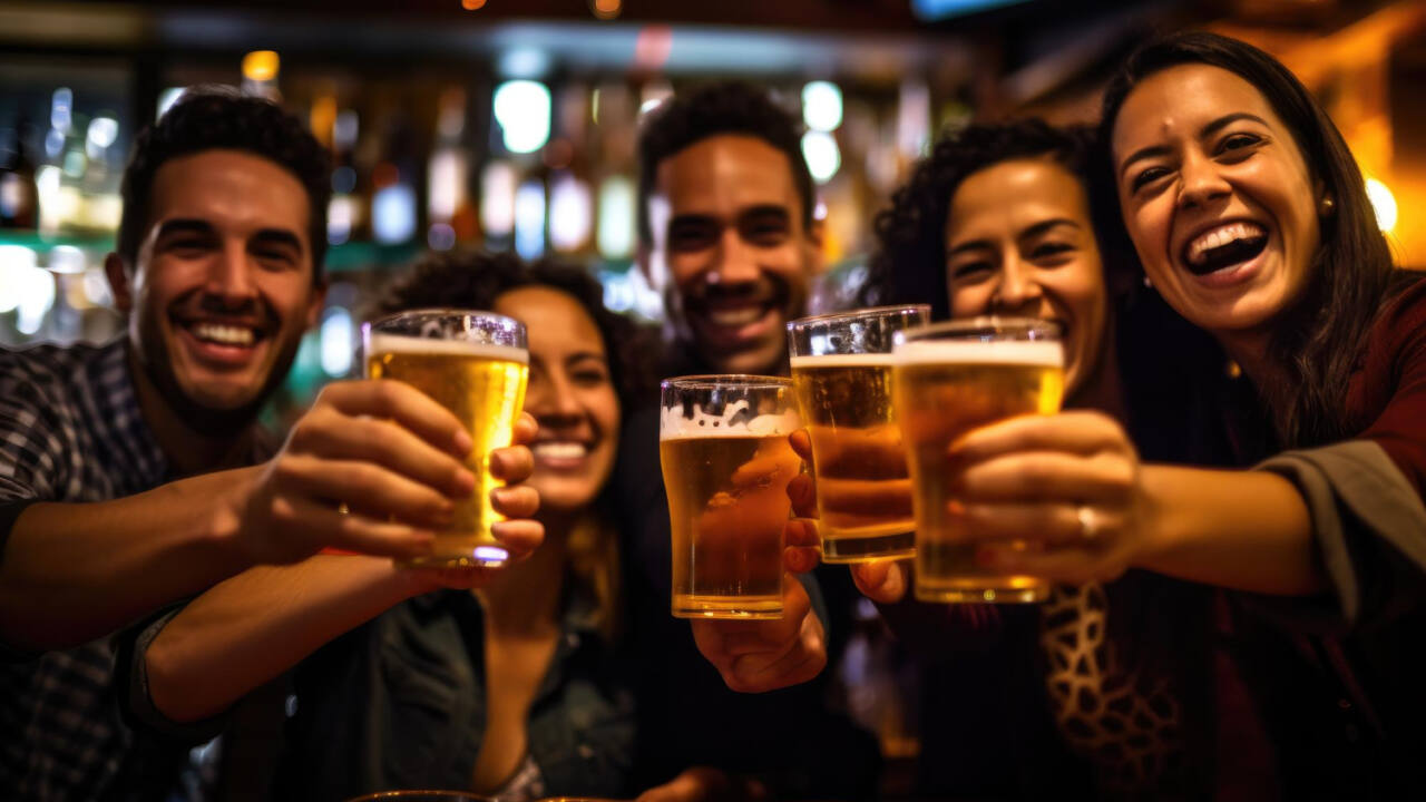 group-friends-toasting-celebrating-with-their-beers-vibrant-well-lit-bar-generative-ai